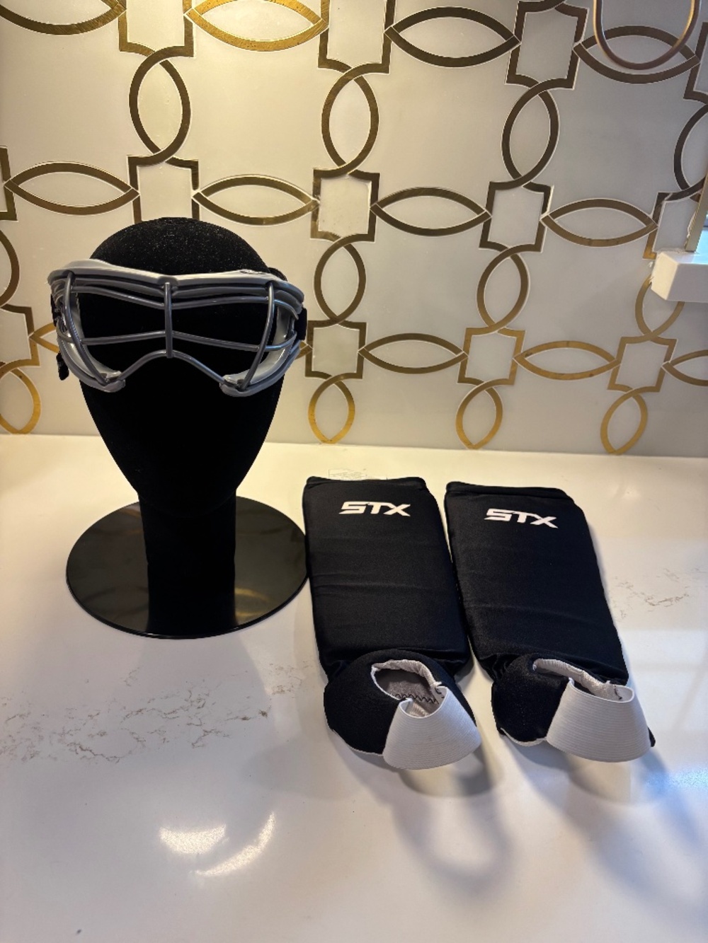 STX Lacrosse 4Sight+ S Goggles and STX Youth Reversible Field Hockey Shin Guard